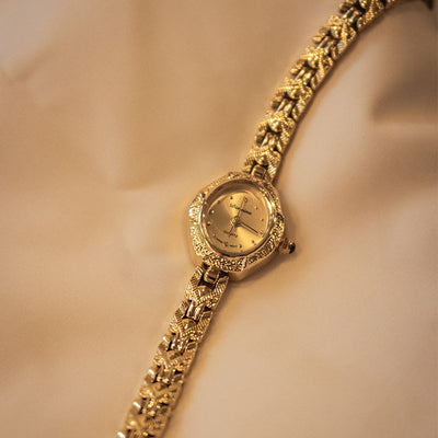 Reloj Antiguo de Cobre Dorado con Tiras Artesanales