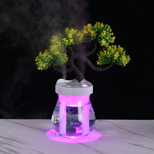 Creative desktop humidifier with artificial red roses, clear base, pink top, and color-changing LED light mist. - Image 2
