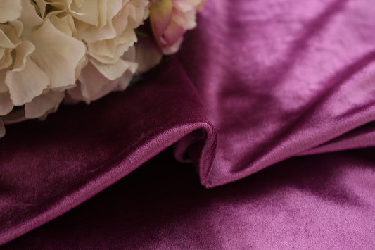 Close-up of draped purple Italian velvet fabric with soft folds and a subtle sheen, suitable for curtains. - Image 2