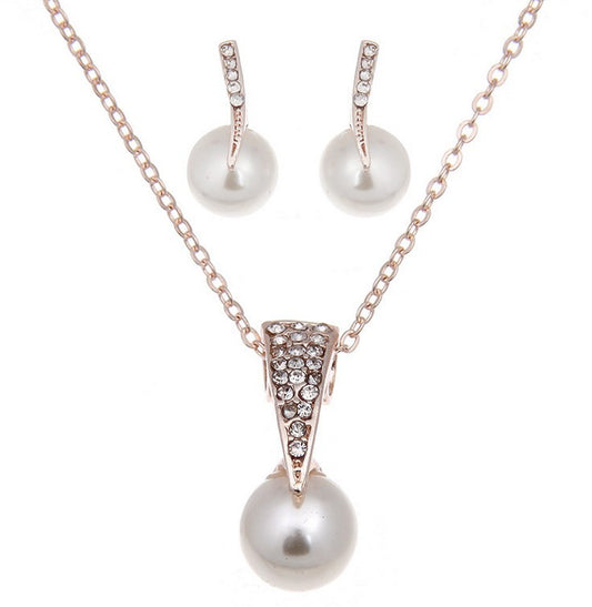 Rose gold-toned necklace and earring set with white pearls and clear rhinestones, ideal for bridal or formal wear. - Image 2