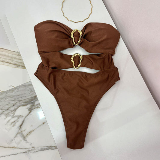 Red one-piece swimsuit with a strapless bandeau top, midriff cut-outs, and two gold-tone buckle details. Features a high-cut bottom. - Image 2