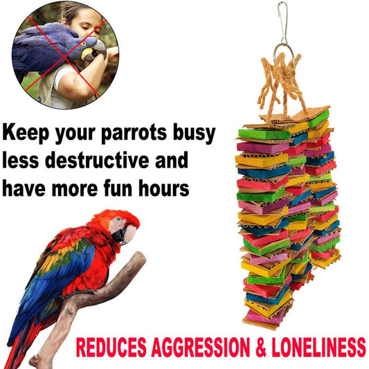 Colorful parrot gnawing toy with stacked cardboard blocks in red, green, yellow, blue, and pink, hanging from a rope. - Image 2