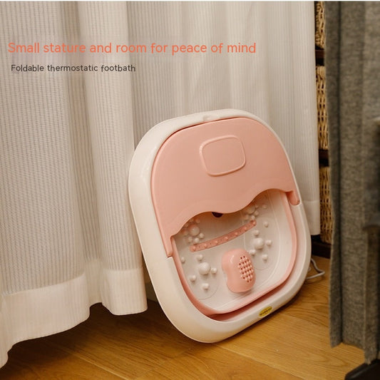 Gray and white collapsible foot spa basin with heating function, massage nubs, and a partial lid. - Image 2