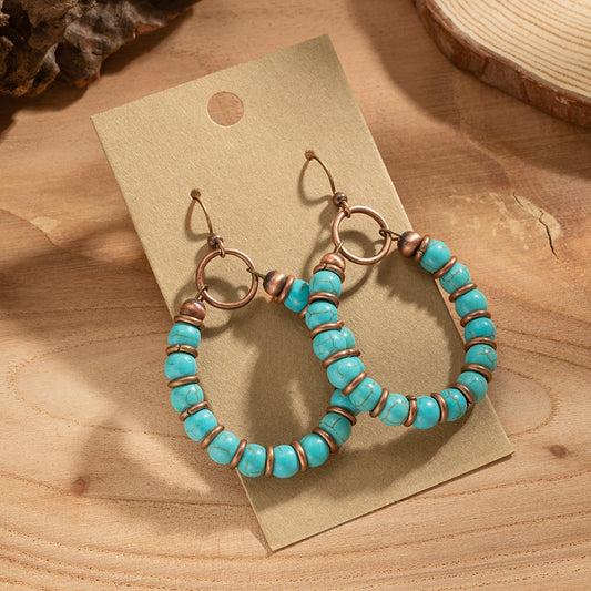 Aretes de Bronce con Tarjeta de Papel Kraft - Image 2
