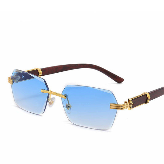 Frameless sunglasses with pink gradient lenses and dark brown wood-look temples with gold-tone accents. - Image 2