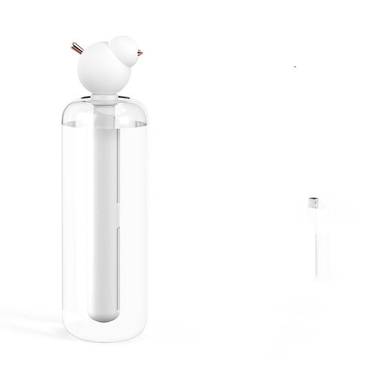 White and clear columnar mini humidifier with a cute bird-shaped top, featuring rose gold beak and tail accents. - Image 2