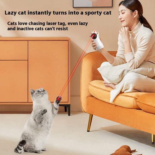 White cat's paw shaped laser toy with orange paw pads and a black laser emitter, labeled "Battery Model." - Image 2