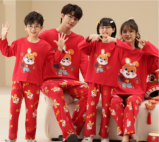 Family of four wearing matching yellow long-sleeved cotton pajamas with a cute panda design and "HUG ME!" text. - Image 2