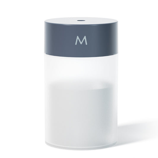 M Style mini humidifier with a light blue top and translucent white body, suitable for bedroom or office. - Image 2