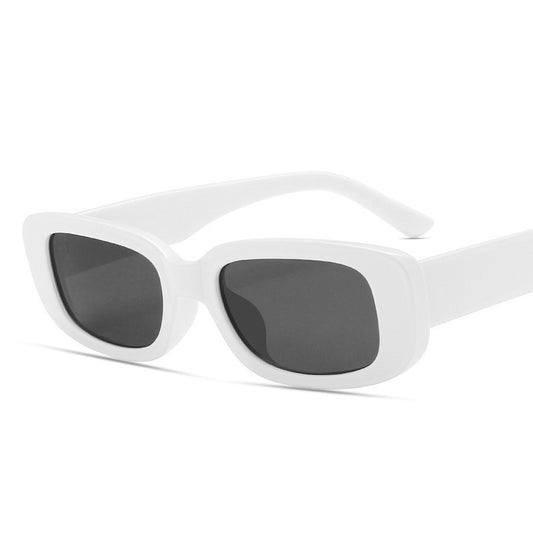 Black rectangular fashion sunglasses with dark lenses, featuring a thick frame and temples, angled on a white background. - Image 2