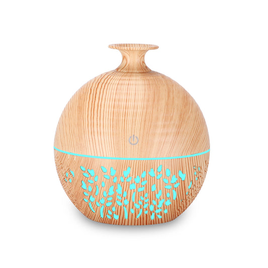 Light wood grain portable mini aroma diffuser humidifier with a vase shape and glowing blue leaf patterns. - Image 2