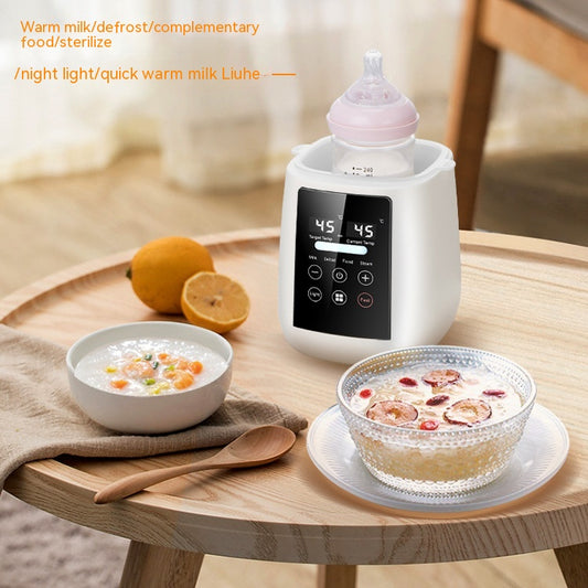 Pink multi-functional single bottle milk warmer with digital display for constant heating, defrosting, and steaming. - Image 2