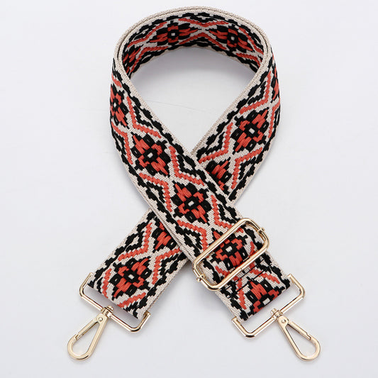Yellow and white ethnic style patterned canvas bag strap with gold-toned adjustable buckle and swivel snap hooks. - Image 2