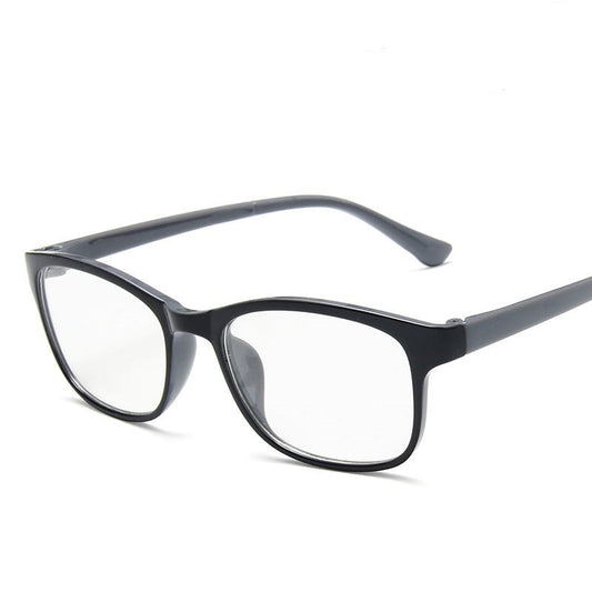 Red and black rectangular anti-blue light glasses with clear lenses, shown at an angle on a white background. - Image 2