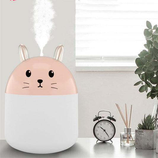 Cute sky blue and white mini USB rabbit humidifier with gold ears, ideal for home or office aromatherapy. - Image 2