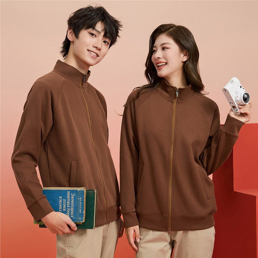 Purple full-zip jacket with a stand-up collar, raglan sleeves, and front pockets, displayed on a hanger. - Image 2