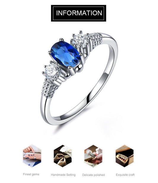 Anillo de Plata Esterlina con Zafiro Azul Real y Halo de Gemas - Image 2
