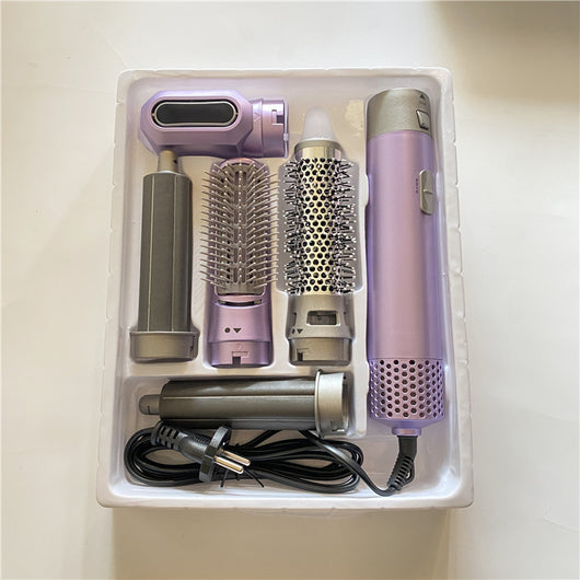 5-in-1 hot air comb hair dryer set with multiple rose red and gray attachments in a white tray. - Image 8