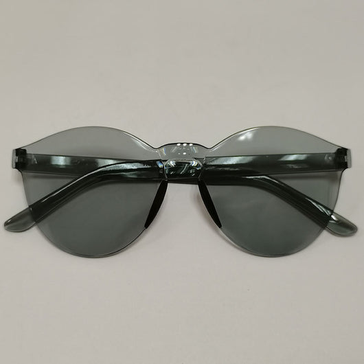 Trendy one-piece candy-colored sunglasses with dark gray lenses and a unique wavy top edge.