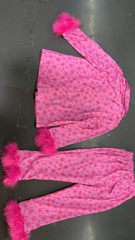 Young girl in a leopard print pajama set with black feather trim on the cuffs and ankles, wearing a pink glitter headband. - Image 20