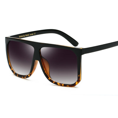 Large frame flat top sunglasses with black frames, brown gradient lenses, and subtle leopard print detail. - Image 26