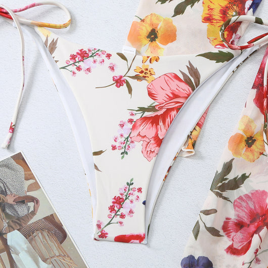 Milky white floral print three-piece swimsuit with triangle bikini top, v-cut bottom, and sheer long-sleeve cover-up. - Image 18