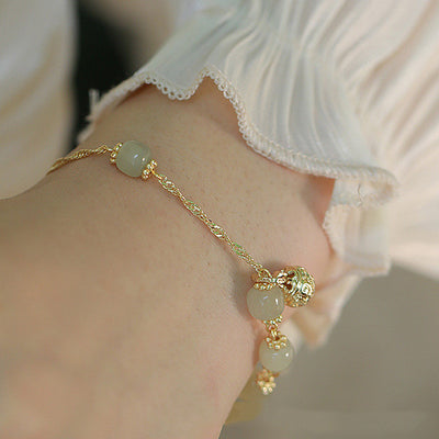 Pulsera de Jade Hetian Natural con Diseño Étnico Tradicional - Image 9