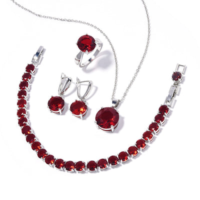 Four-piece jewelry set with silver-toned metal and round deep pink gemstones, including a necklace, bracelet, ring, and earrings. - Image 15