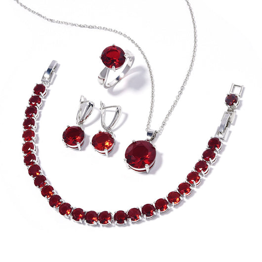 Four-piece jewelry set with silver-toned metal and round deep pink gemstones, including a necklace, bracelet, ring, and earrings. - Image 15