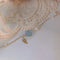 Pulsera Rosa Moonlight Gris con Hoja de Oro