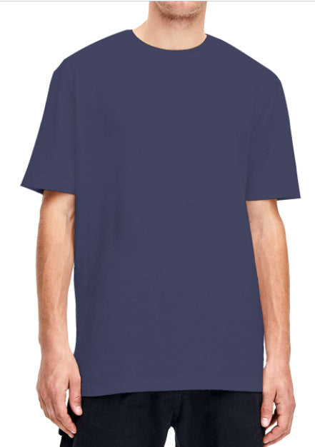 Plain light beige short-sleeved crew neck t-shirt made of cotton, shown on a model. - Image 29