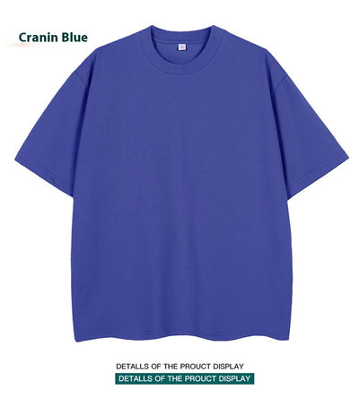 Moss green short-sleeve cotton t-shirt with a crew neck and a relaxed, oversized fit. - Image 30