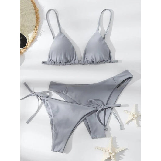 Lavender three-piece bikini set with a triangle top, tie-side bottom, and high-cut bottom, displayed with a straw hat and purple sunglasses. - Image 7