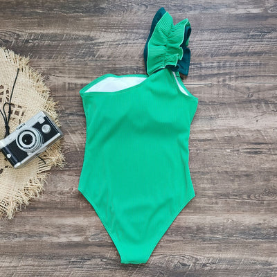 Black one-shoulder ribbed one-piece swimsuit with a ruffled blue and black strap, ideal for women's swimwear. - Image 39