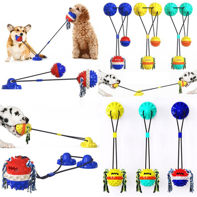 Red, white, and blue textured dog chew toy with rope tassels and a blue suction cup base, shown with a Dalmatian puppy playing.
