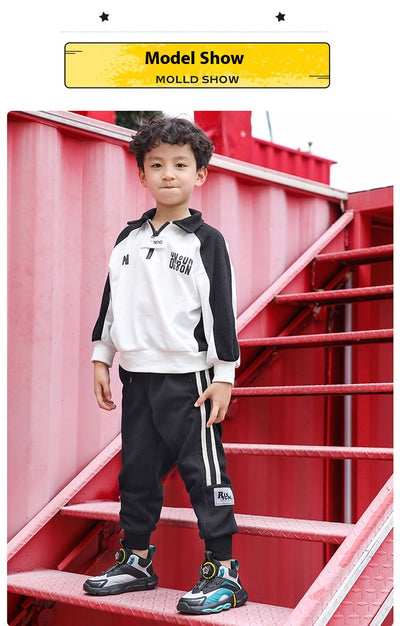 Black, white, and neon green children's basketball shoes with rotating buckle closure, featuring a mid-top design. - Image 11