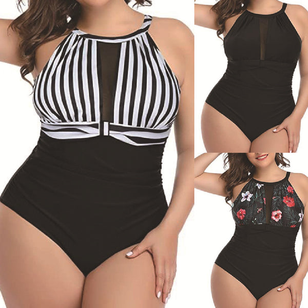 Plus size black one-piece swimsuit with a halter neck and mesh V-neck insert, featuring ruched sides.