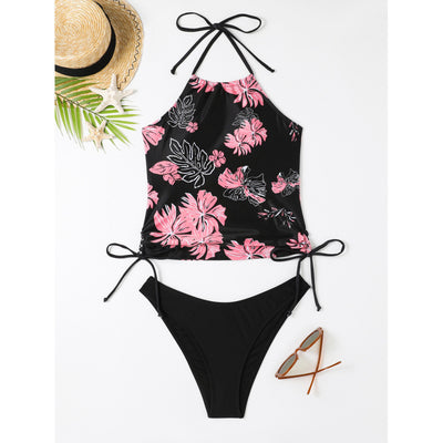 Black halter-neck tankini swimsuit with pink and white floral print, paired with solid black high-cut bikini bottoms. - Image 6