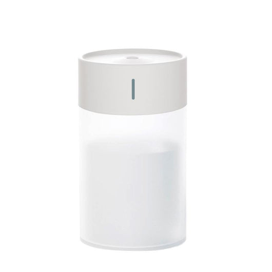 Cylindrical humidifier with a frosted white body and a light pink top, featuring a small mist outlet. - Image 11