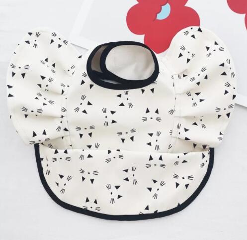 Babero Impermeable con Bolsillo Alas de Ángel para Bebé - Image 34