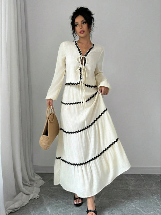 Conjunto Elegante con Blusa de Encaje y Falda Plisada con Mangas Farol - Image 12