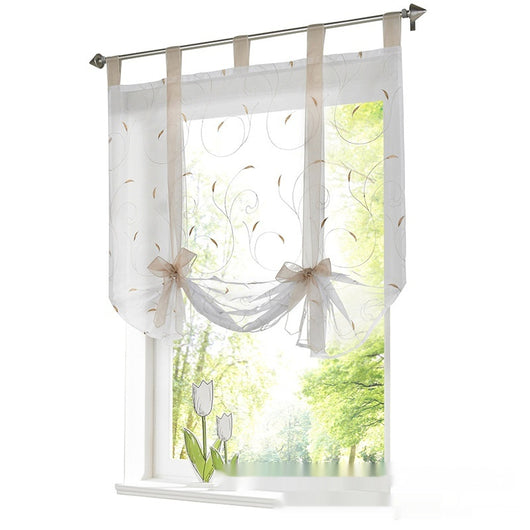 White sheer Roman window screen with red embroidered floral patterns and red ribbon ties, hanging from a silver rod. - Image 4