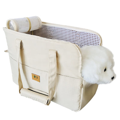 Two-tone beige and brown canvas pet carrier bag with mesh top and a small white dog peeking out. - Image 6
