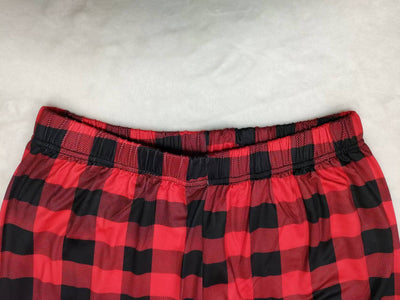 Family of four wearing matching red and black buffalo plaid Christmas pajamas with reindeer and "Merry Christmas" text. - Image 8