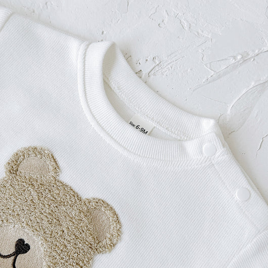 White long-sleeve baby hoodie with a brown bear print and matching ribbed beige sweatpants set. - Image 17