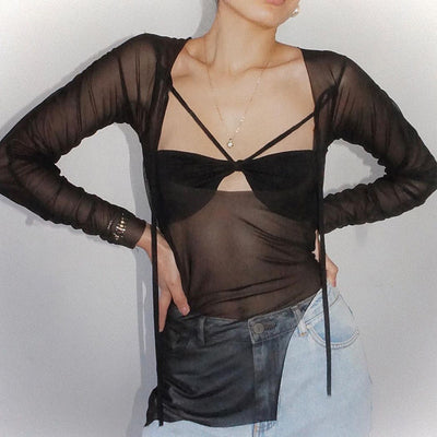 Blusa Larga de Manga Larga con Cuello Halter y Detalles Transparentes