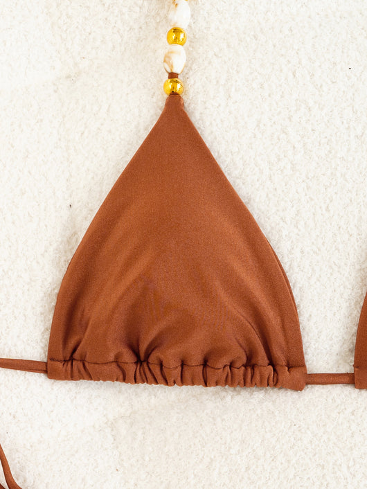 Solid brown two-piece bikini with triangle top and tie-side bottoms, featuring decorative beads on the top straps. - Image 14