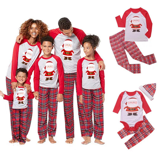 Family of five wearing matching red and grey Christmas pajamas with Santa Claus print tops and red plaid pants. - Image 2