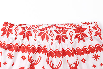 Red and white long-sleeved family matching pajamas with reindeer and snowflake pattern for dad, mom, kid, and baby. - Image 6