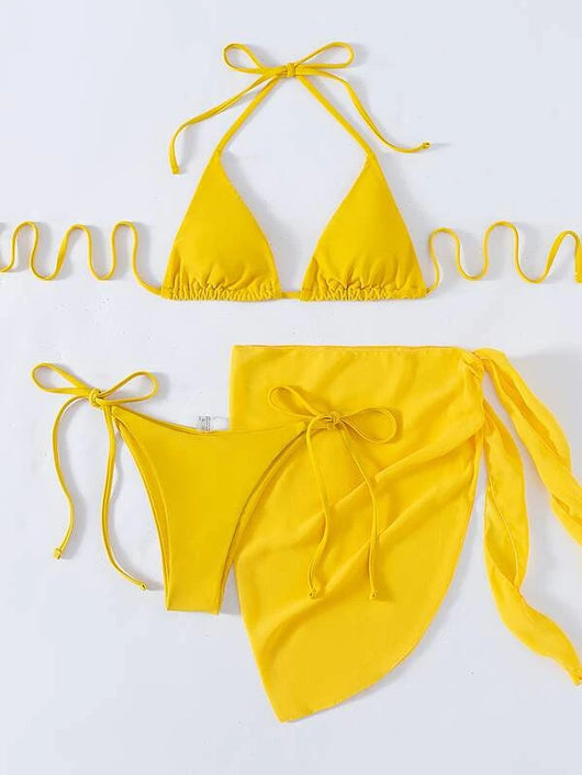 Neon yellow three-piece bikini set with triangle cup lace-up top, tie-side bottom, and matching sarong, displayed with a straw hat and sunglasses. - Image 19